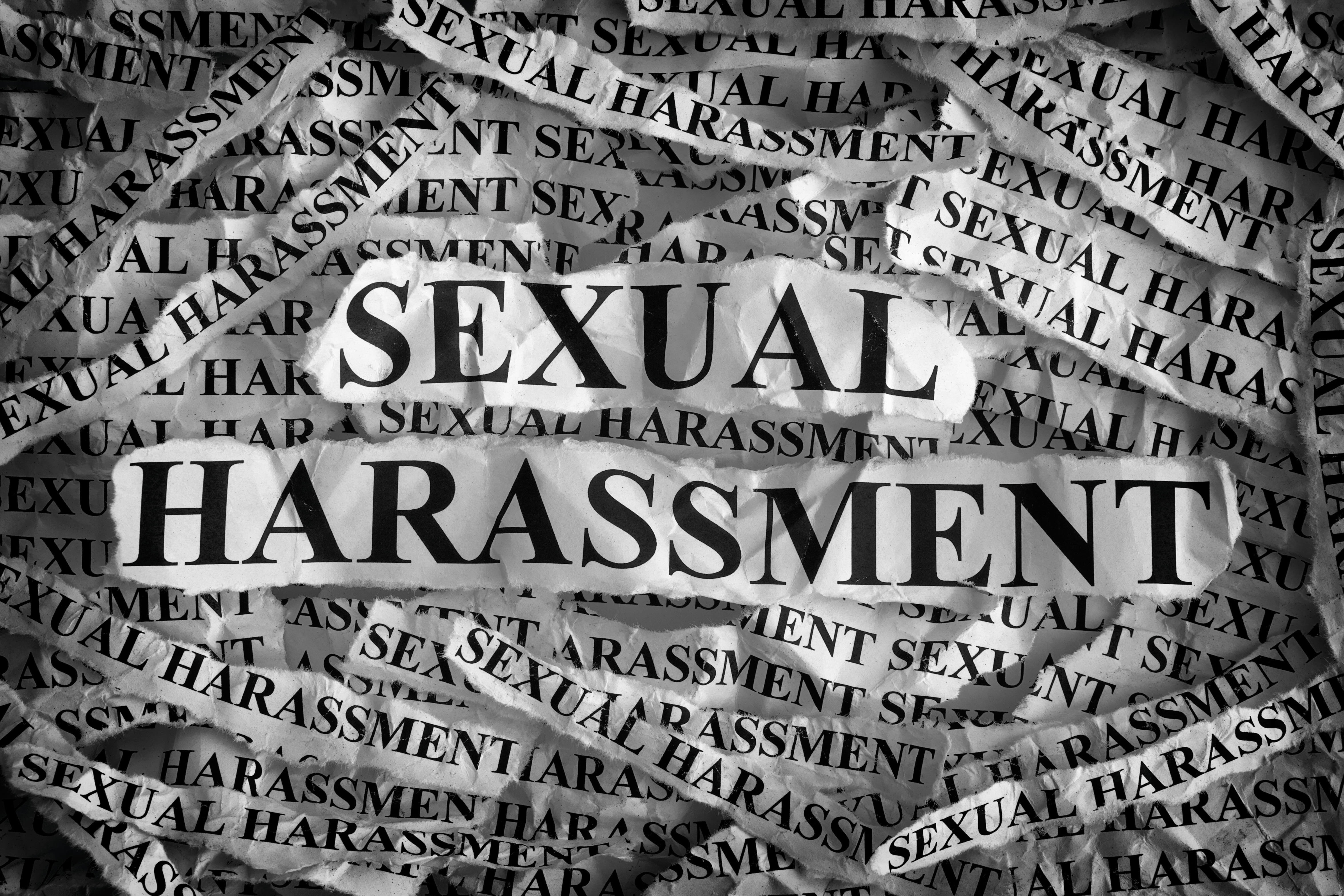 The word Sexual Harassment is the key item on the image with the same word in smaller text in the background in a newspaper style